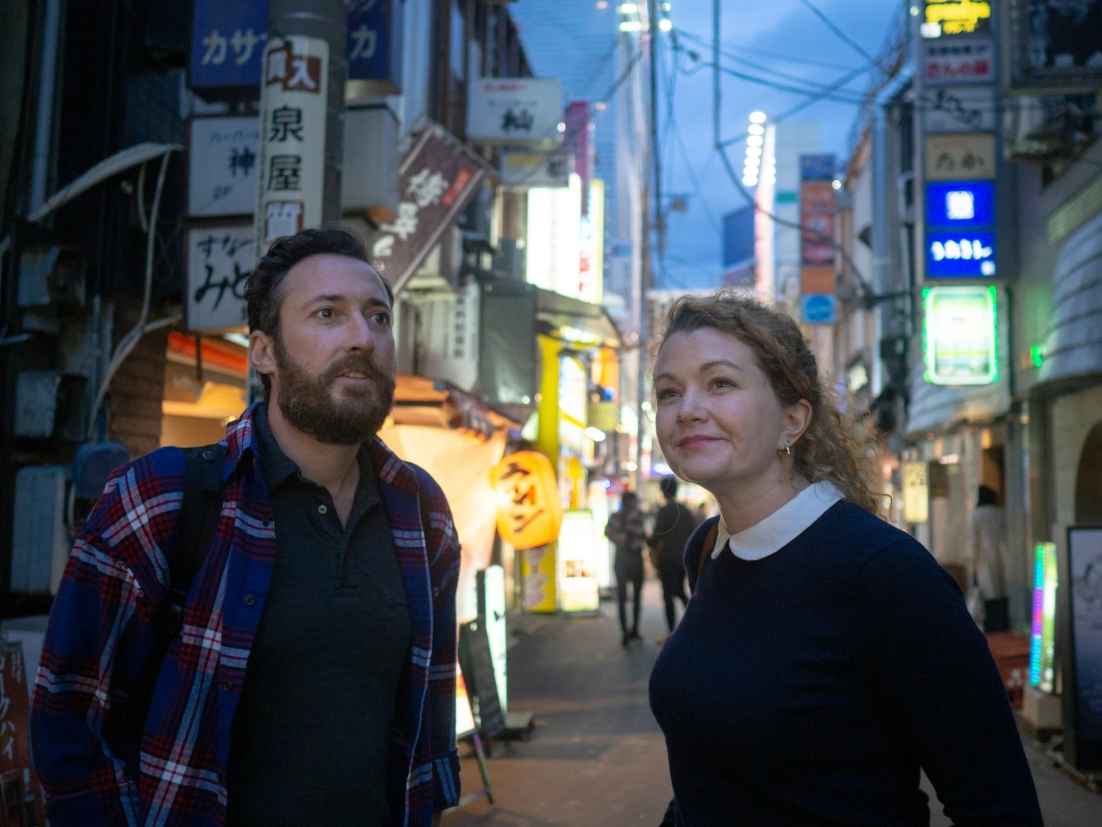 Couple arriving in Japan with luggage